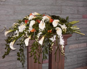 Calla lilies in an elegant casket arrangement