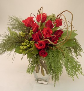 Design of 14 red roses with berries, branches and greens