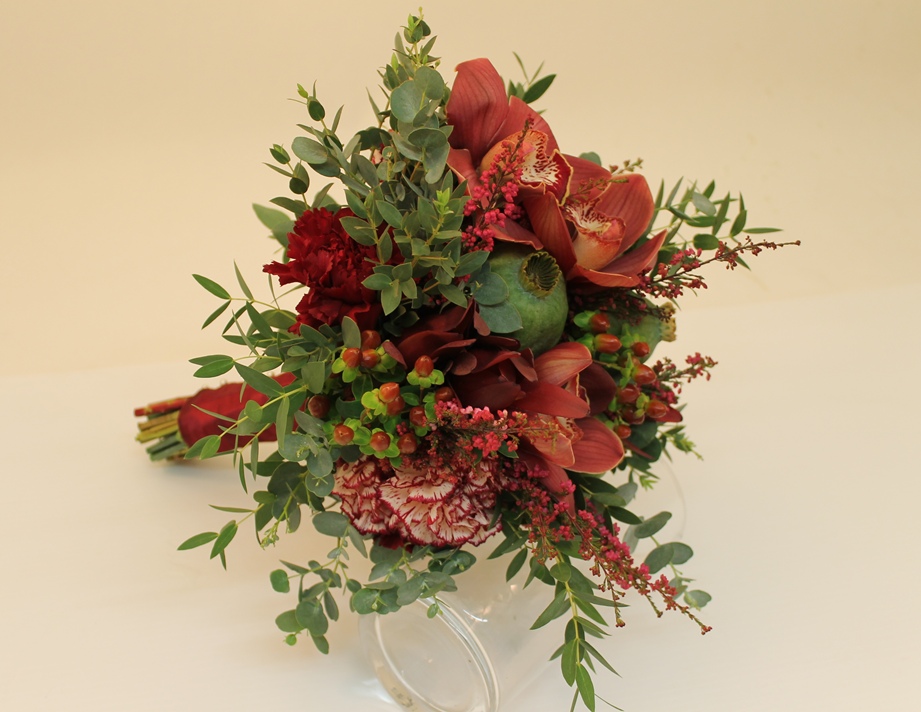 Take a look at the Bride's Bouquet An informal bridal bouquet in red tones
