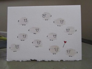 Flock of sheep, two in love