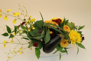 Fall centrepiece with eggplant and artichokes