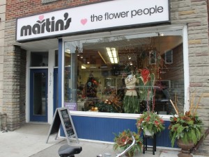 Christmas Urn Arrangements on the sidewalk