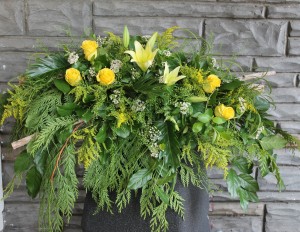 Yellow roses, lilies, birch branches