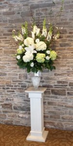 Tall vase of white flowers