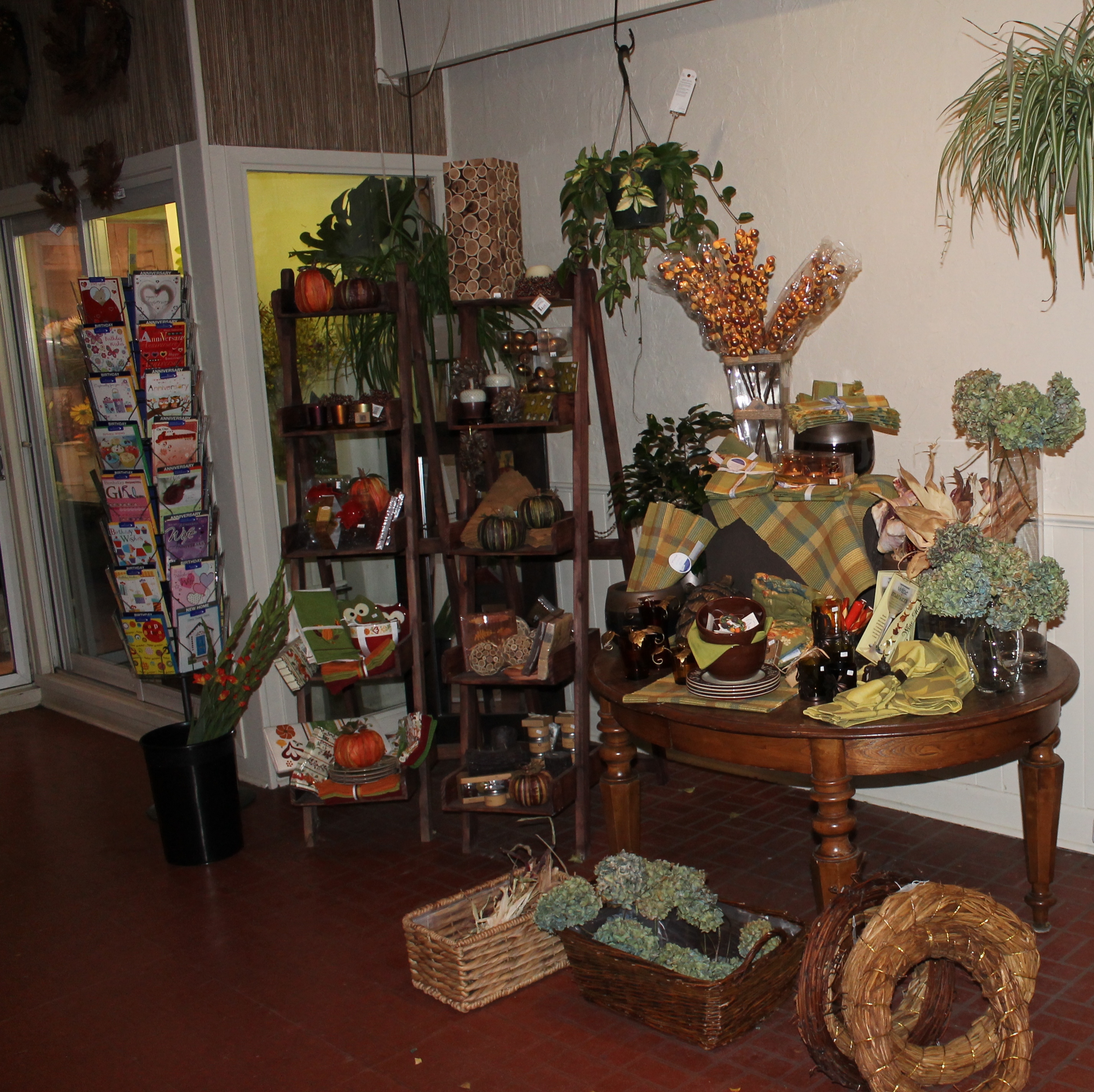 Autumn candles, napkins, bowls and gifts on display