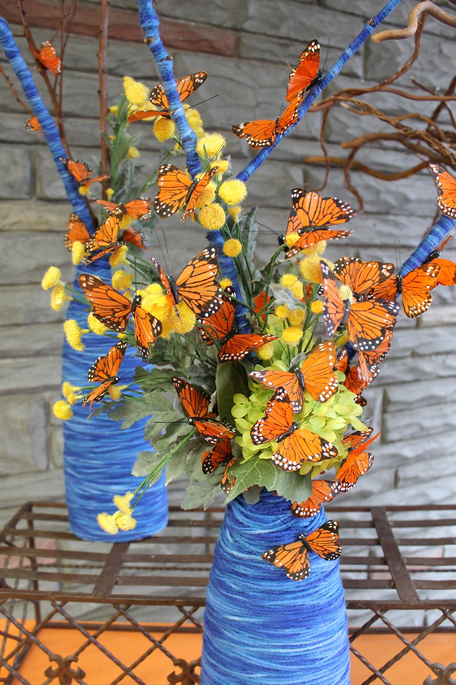 Yarnwrapped vases with butterflies Martin's, the Flower People